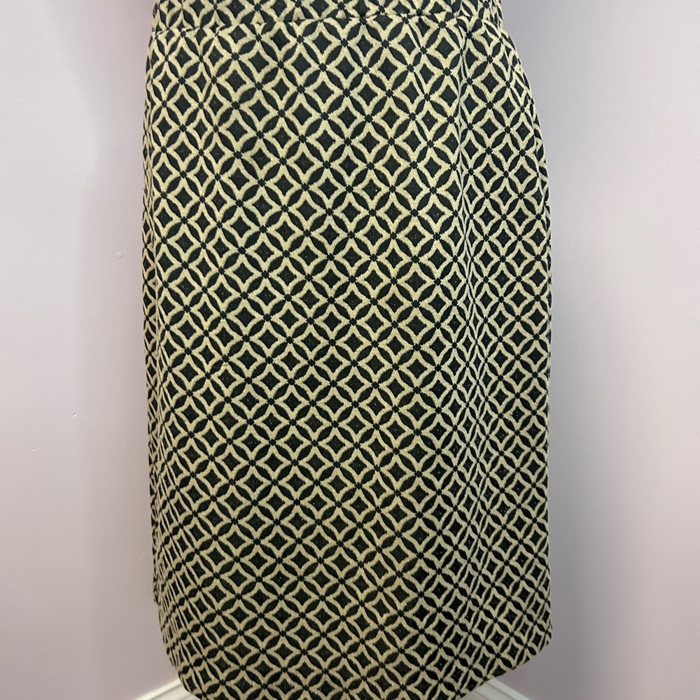 Cato ~ Women’s medium tan and black pencil style skirt with slit in the back.